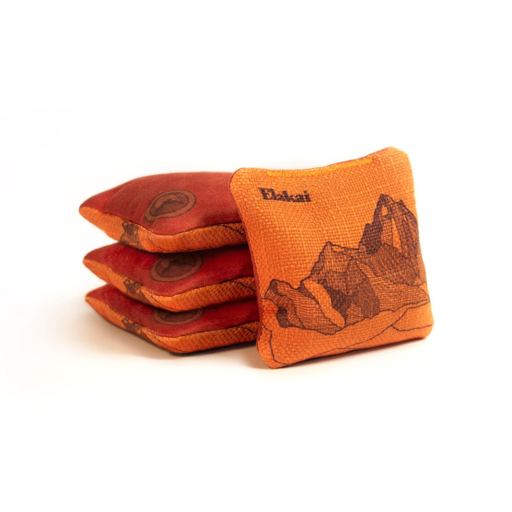 Elakai 4-in Travel Dual-Sided Cornhole Bags | Mt. Elakai Design Collection Orange Horizon | Heirloom Boulevard