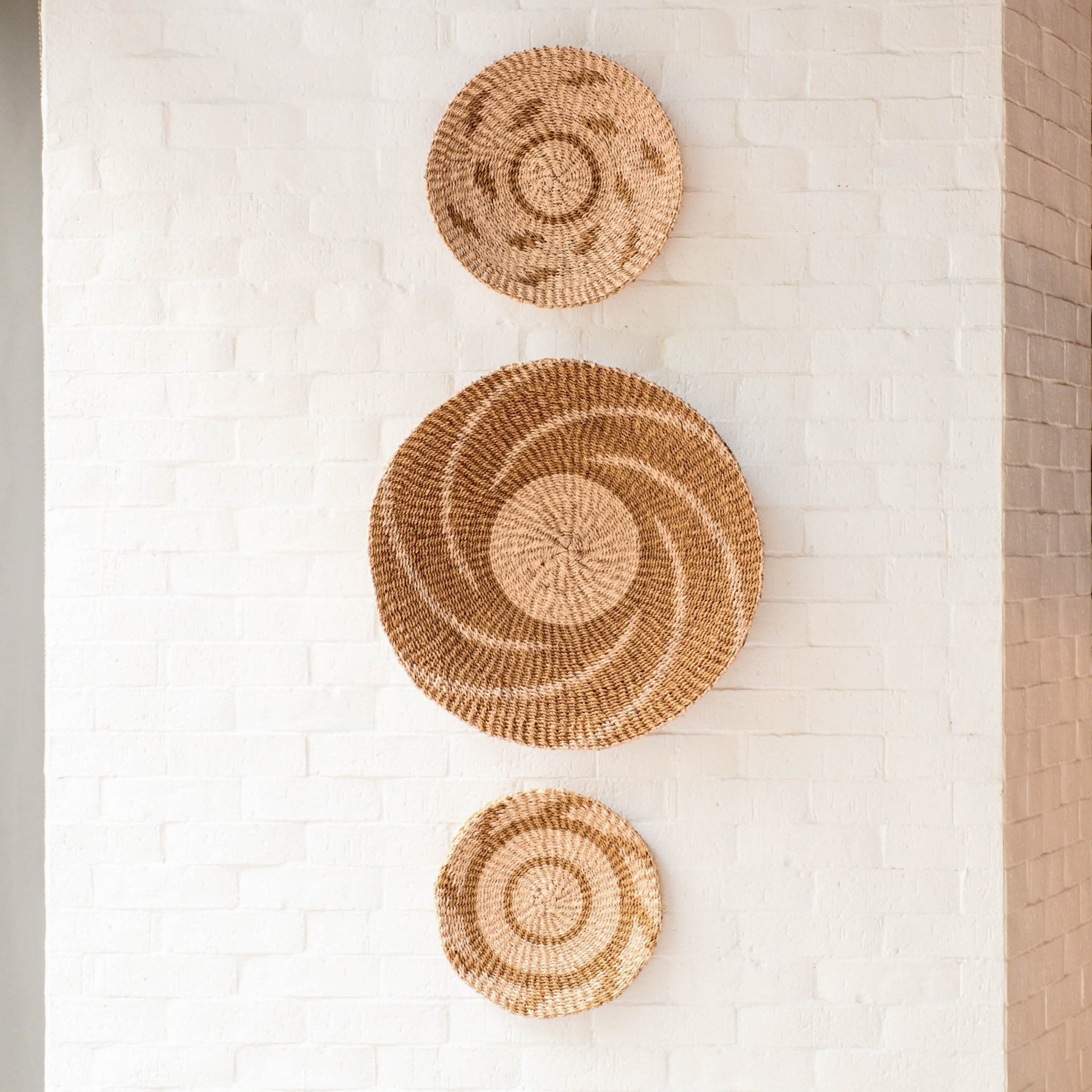 LIKHÂ Natural + Brown Wall Baskets, Small - Round Wall Baskets | LIKHÂ LIKHÂ | Heirloom Boulevard
