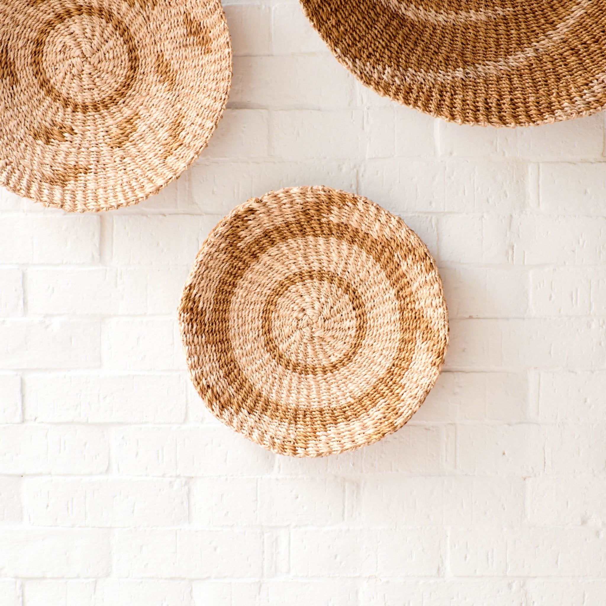 LIKHÂ Natural + Brown Wall Baskets, Small - Round Wall Baskets | LIKHÂ LIKHÂ | Heirloom Boulevard